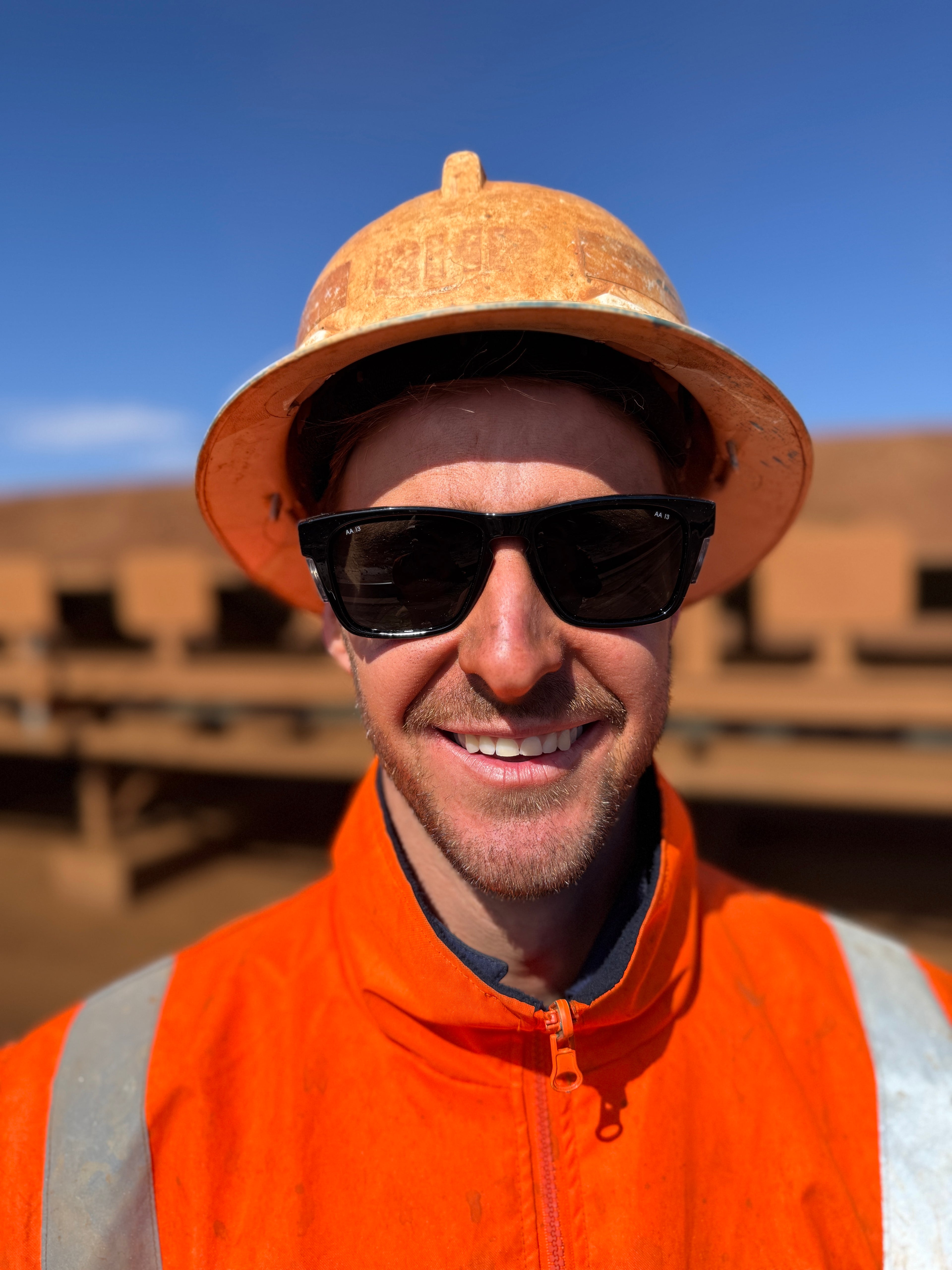 Pilbara Edition Gloss Black safety glasses with grey polarised lenses